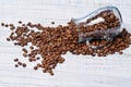 Glass milk jug and coffee beans Royalty Free Stock Photo