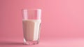 Glass of Milk on Pink Background - Dairy Beverage Simplicity Royalty Free Stock Photo