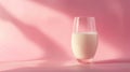 Glass of Milk on Pink Background - Dairy Beverage Simplicity. World Milk Day Royalty Free Stock Photo