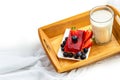 A glass of milk and a slice of strawberry cake with strawberries Royalty Free Stock Photo