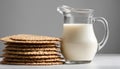 A glass of milk with a spoon in it and crackers Royalty Free Stock Photo