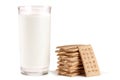 Glass of milk with stack of grain crispbreads on white background Royalty Free Stock Photo