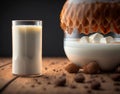 A glass of milk on the table with sweets made of milk Royalty Free Stock Photo