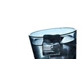 Glass of mineral carbonated water with ice.Closeup.Isolated Royalty Free Stock Photo