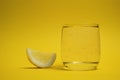 A glass mineral water with lemonwedge Royalty Free Stock Photo