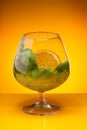 Glass with mint and orange drink