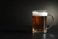 Glass mug with cold tasty beer Royalty Free Stock Photo