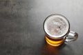 Glass mug with cold tasty beer Royalty Free Stock Photo