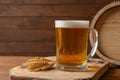 Glass mug with cold tasty beer and malt Royalty Free Stock Photo