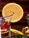 Glass mug with slice lemon and Christmas ball . Royalty Free Stock Photo