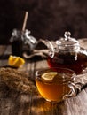 Glass mug with tea with a slice of lemon Royalty Free Stock Photo