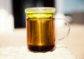 Glass mug and tea strainer Royalty Free Stock Photo