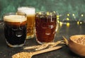 Glass mugs with various kinds of beer on table Royalty Free Stock Photo