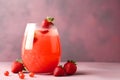 A glass of non classic strawberry margarita garnished with a strawberry on dirty purple background. Summer red or pink cocktail