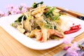 Glass noodles with rice, meat, vegetables and flowers Royalty Free Stock Photo