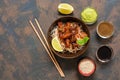 Glass noodles with vegetables and meat. Korean dish, top view. Stir-Fred Pork. Rustic rusty background, copy space. Royalty Free Stock Photo