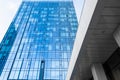 Glass office building exterior against the sky Royalty Free Stock Photo