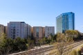 Glass office buildings and apartments along a side a set of railroad tracks with clear blue sky in midtown Atlanta Royalty Free Stock Photo