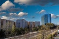 Glass office buildings and apartments along a side a set of railroad tracks with clear blue sky in midtown Atlanta Royalty Free Stock Photo