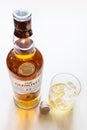 Glass and open bottle of Glenlivet Scotch whisky Royalty Free Stock Photo