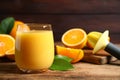 Glass of orange juice and fresh fruits on table, closeup Royalty Free Stock Photo