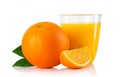 Glass with orange juice and fruits with green leaves isolated Royalty Free Stock Photo