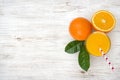 Glass of orange juice and fruits on vintage wooden background Royalty Free Stock Photo