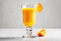 A glass of orange juice and juicy oranges. Fresh seasonal citrus fruits, natural juice