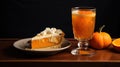 A glass of orange juice with a piece of pumpkin pie with cream. A pumpkin and an orange peel are on the table next to it