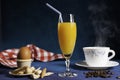 Glass of orange juice and steaming cup of coffee Royalty Free Stock Photo