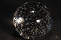 Glass orb with traped air bubbles Royalty Free Stock Photo