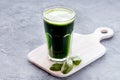 Glass of organic juice Wheat Grass Spinach and sprout detox drink Healthy and diet drink Wooden board Copy space Royalty Free Stock Photo