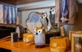 Glass owls and onyx holders sold at the gift store