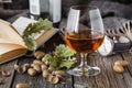 Glass oÃÂ° amber color whisky in glass on oak table