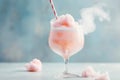 Glass of pastel coloured cotton candy cocktail on bright pink and blue background. Generative AI Royalty Free Stock Photo