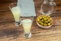 glass of Pastis on a table Royalty Free Stock Photo