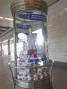 A glass pedestal with the symbols of the Confederations Cup 2017 and the 2018 World Cup in the metro station with a mannequin in t