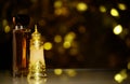 Glass perfume bottle dark background