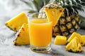 glass of pineapple juice with pineapples
