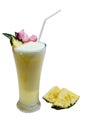 A Glass of Pineapple Smoothies with Sliced Pineapples Royalty Free Stock Photo