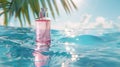 Glass pink bottle with perfume in clear blue water on the beach Royalty Free Stock Photo