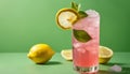 A glass of pink lemonade with lemon slices on the side Royalty Free Stock Photo