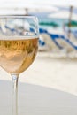 Glass of Pink Wine on the Beach Royalty Free Stock Photo