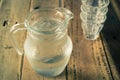 Glass pitcher of water and glass. Royalty Free Stock Photo