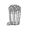 A glass of popcorn, hand-drawn in sketch style. Food at the movies. Pop corn in a paper striped glass. Vector simple illustration