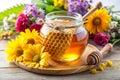 Glass Pot of Honey and Honeycomb with Fresh Flowers Royalty Free Stock Photo