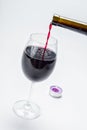 In a glass pour red wine Royalty Free Stock Photo