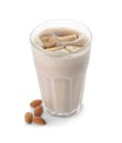 Glass of protein shake and almonds isolated Royalty Free Stock Photo