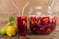 Glass and punch bowl of sangria Royalty Free Stock Photo