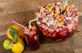 Glass and punch bowl of sangria Royalty Free Stock Photo
